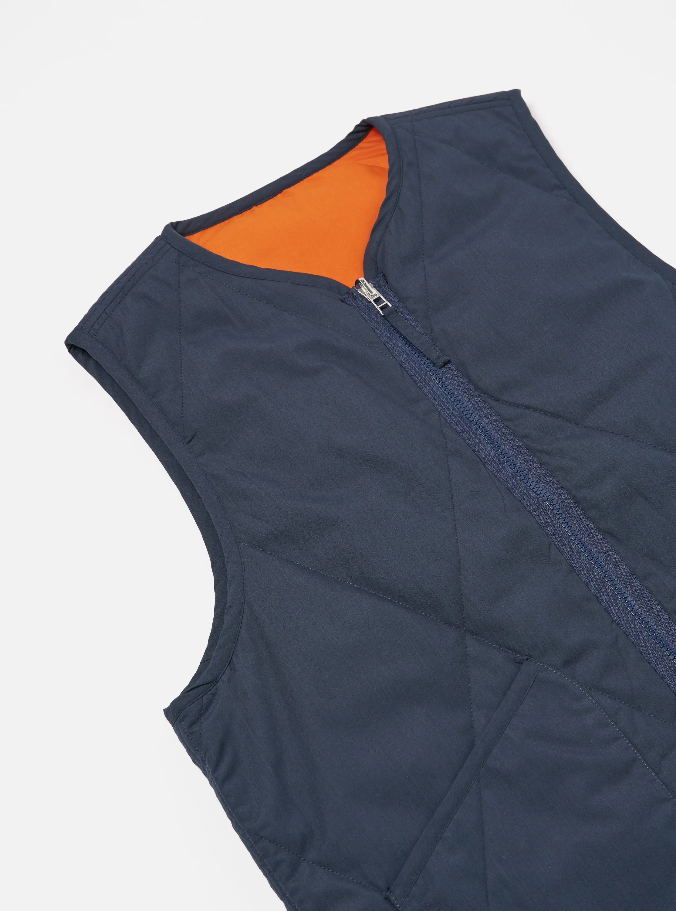 Universal Works Reversible Military Liner Gilet in Navy/Orange Recycled Polytech